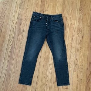 High-waisted black Levi’s 501 skinny jeans